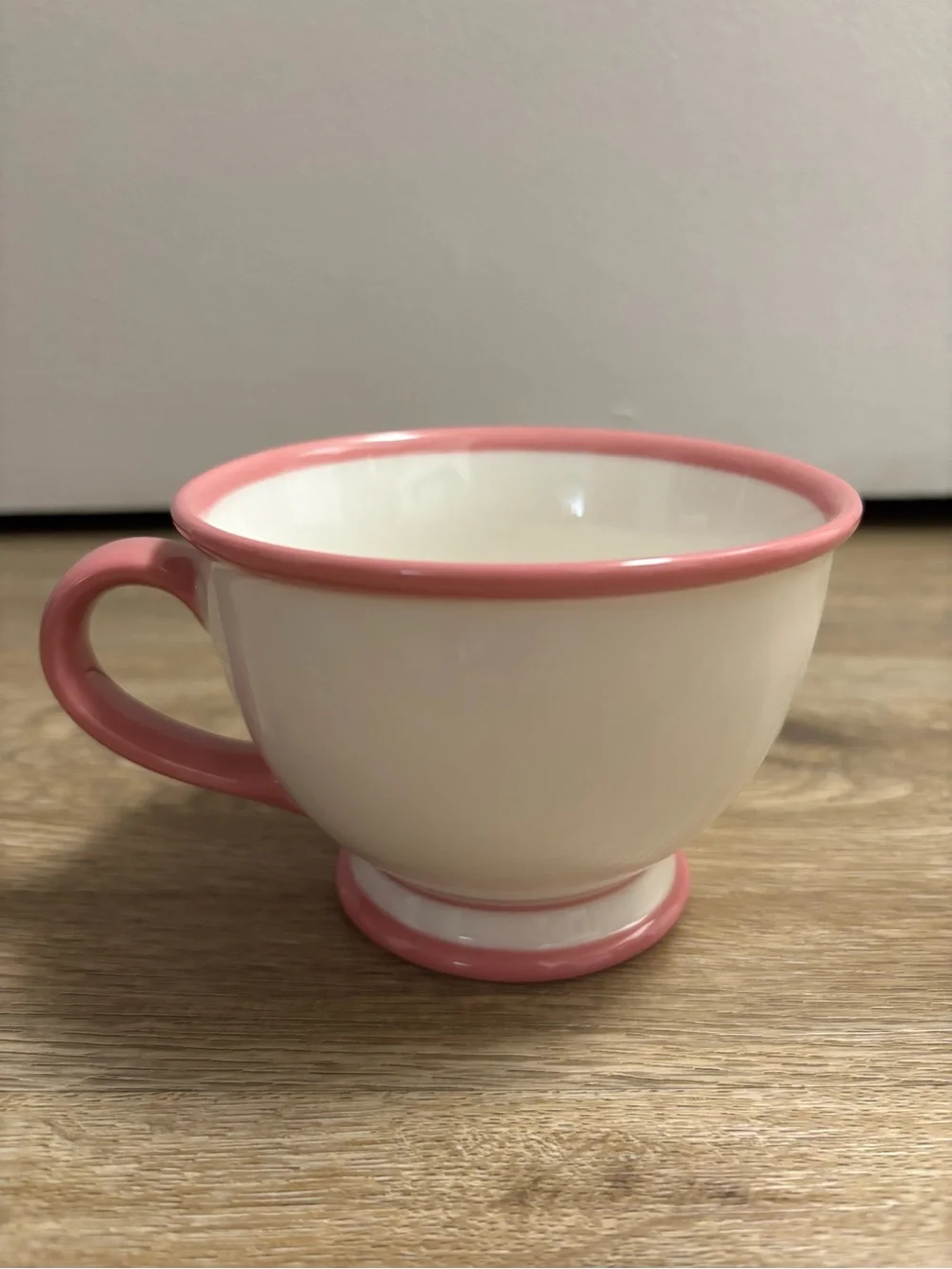 Starbucks Cream Ceramic Teacup with Pink Trim and Floral Motif